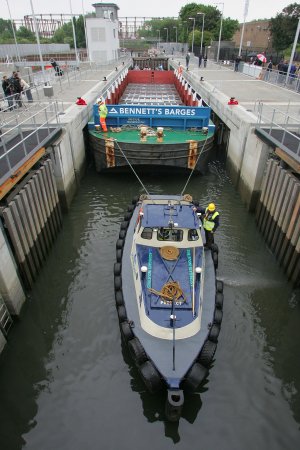 The first barge through the new lock